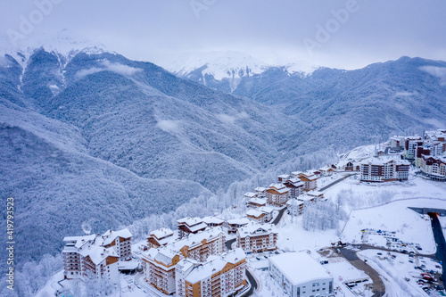 Winter aerial view of the Ski Resort Rosa Khutor. A complex of hotels on the site of the former Olympic village of Rosa Plateau at an altitude of 1170 m from sea level. Krasnaya Polyana, Sochi, Russia © Alexey Oblov