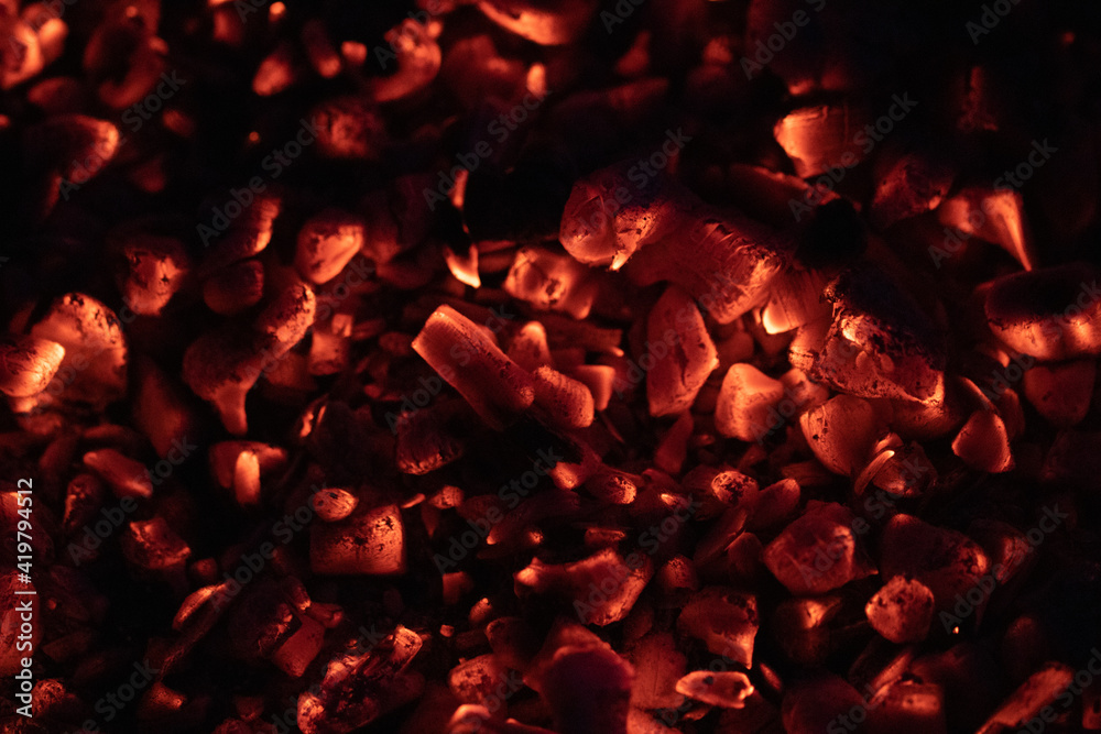 Hot Red Coal Background. Burning Fire in the dark Hot Red Coal Background. Burning Fire in the dark