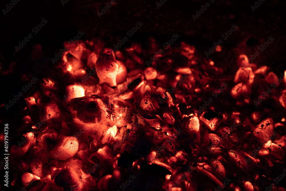 Hot Red Coal Background. Burning Fire in the dark Hot Red Coal Background. Burning Fire in the dark