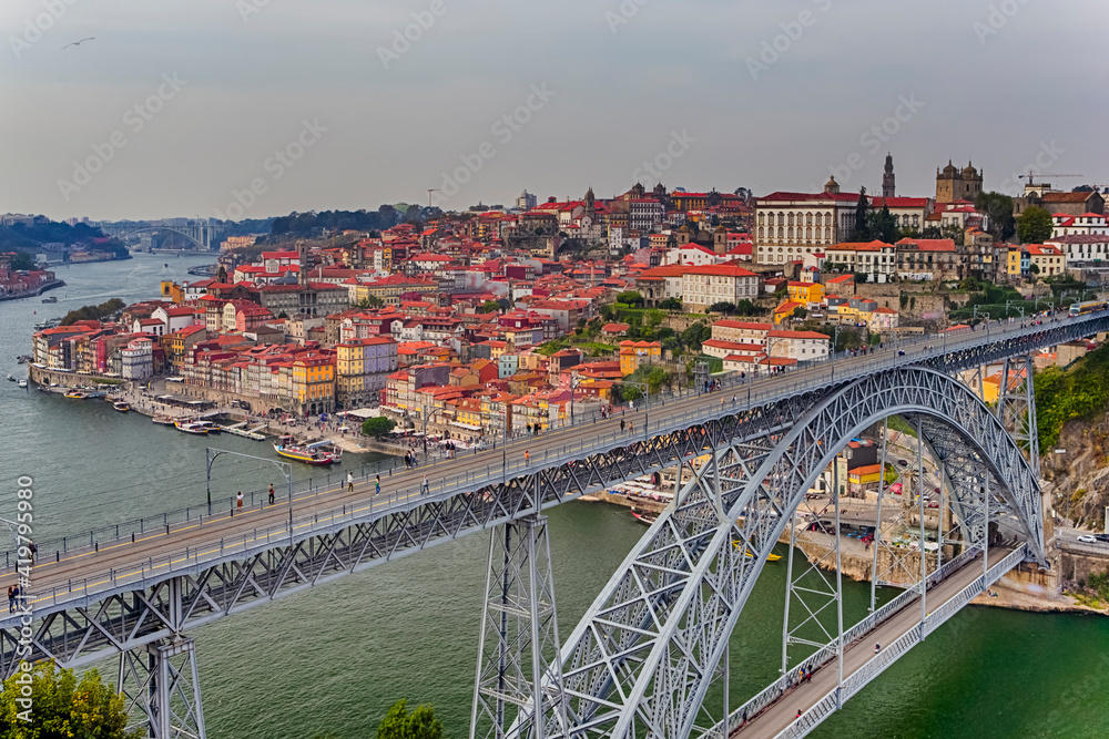 Portugal Traveling. Porto Cityscape at Daytime with Dom Luis I Bridge in Foregounrd in Portugal.