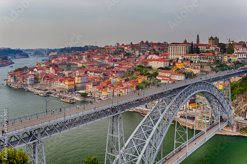 Portugal Traveling. Porto Cityscape at Daytime with Dom Luis I Bridge in Foregounrd in Portugal.