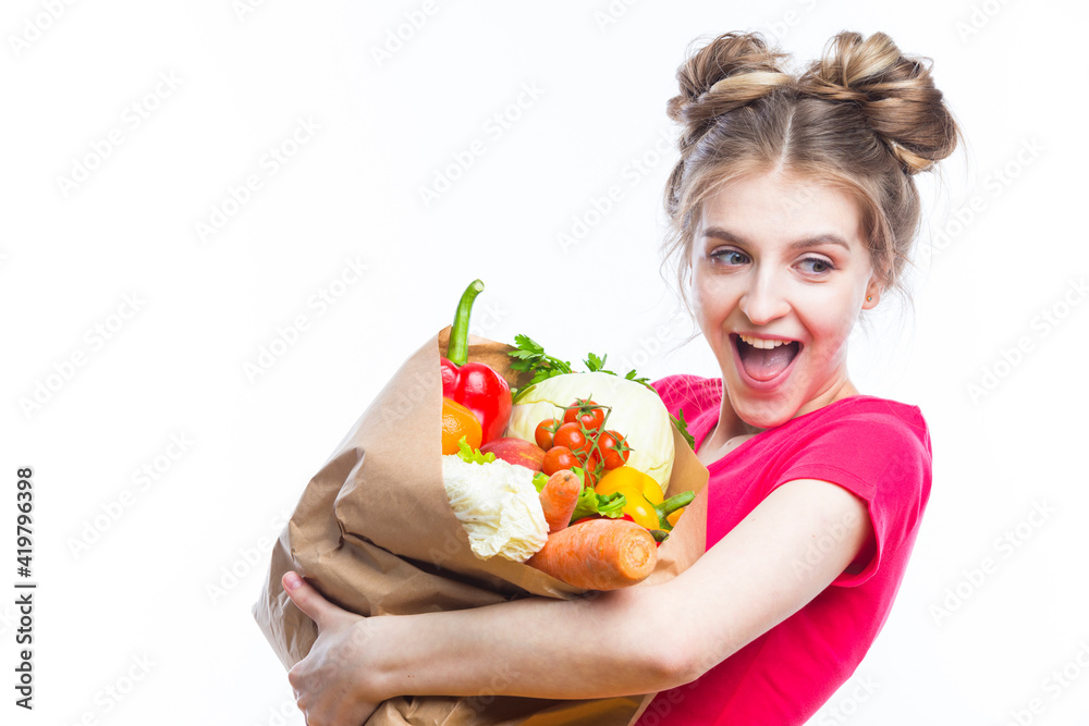 Healthy Eating. Positive Caucasian Girl Posing With Eco Shopping Bag Filled With Vegetables. Horizontal Image Orientation Healthy Eating. Positive Caucasian Girl Posing With Eco Shopping Bag Filled With Vegetables. Horizontal Image Orientation