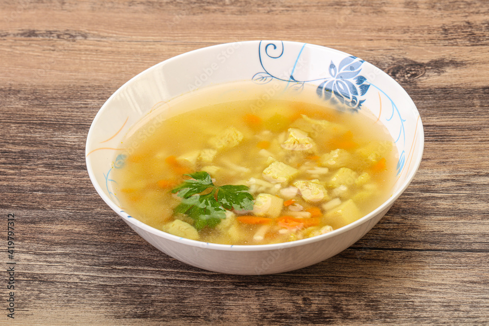 Tasty chicken soup with carrot Tasty chicken soup with carrot