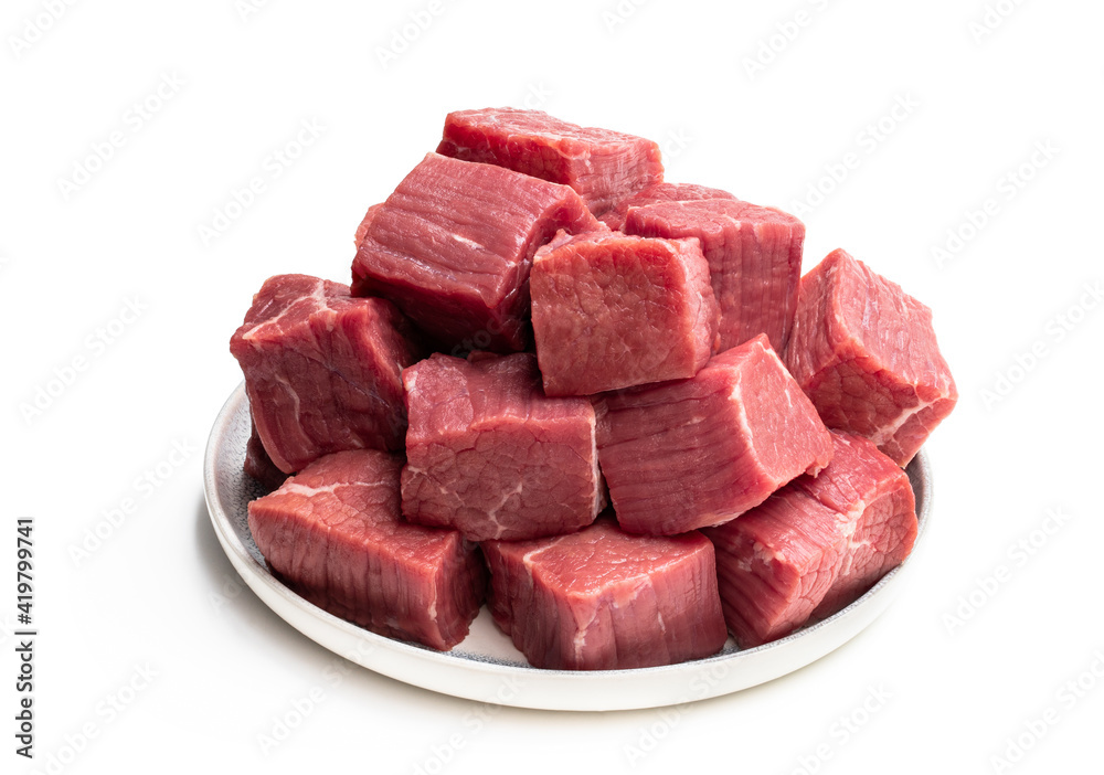 Fresh raw beef in ceramic plate isolated on white Fresh raw beef in ceramic plate isolated on white