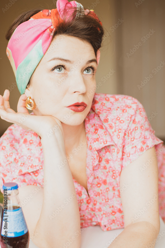A beautiful girl in bright clothes and accessories. Retro style A beautiful girl in bright clothes and accessories. Retro style