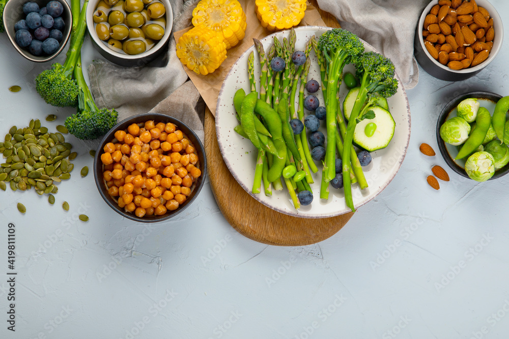 Healthy plant based food, best protein source on light grey background. Healthy plant based food, best protein source on light grey background.