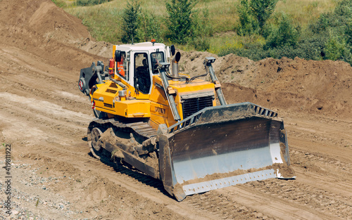 Track-type bulldozer. Earth-moving equipment.