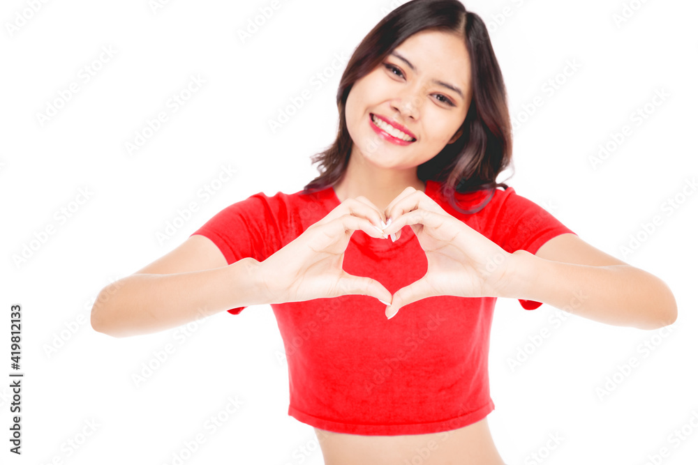 Cheerful beautiful girl making heart by hands isolated on a white background. Female hands making sign Heart by fingers, Cheerful beautiful girl making heart by hands isolated on a white background. Female hands making sign Heart by fingers,