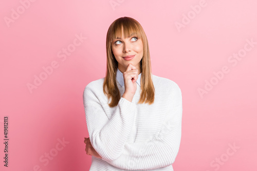 Photo of young happy smiling cheerful lovely attractive woman thinking look copyspace isolated on pink color background