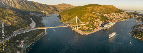 Aerial panorama drone shot of Dubrovnik bridge at Port Gruz in Lapad peninsula in Croatia summer sunset photo