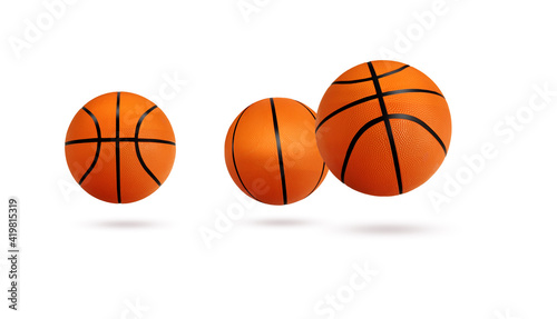 Basketball ball over white background. © pornchai