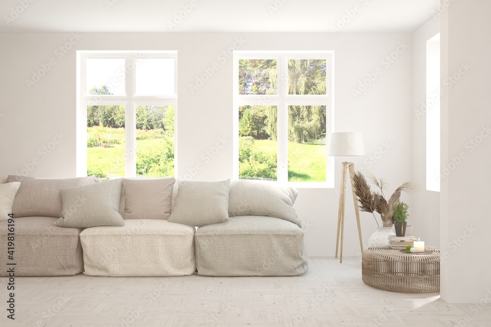 Fototapeta premium White living room with sofa and summer landscape in window. Scandinavian interior design. 3D illustration
