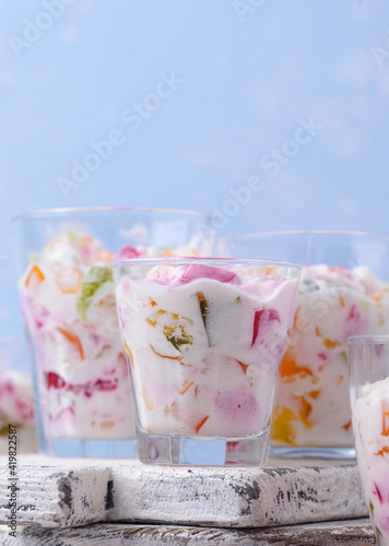 Multicolored dessert with fruit jelly