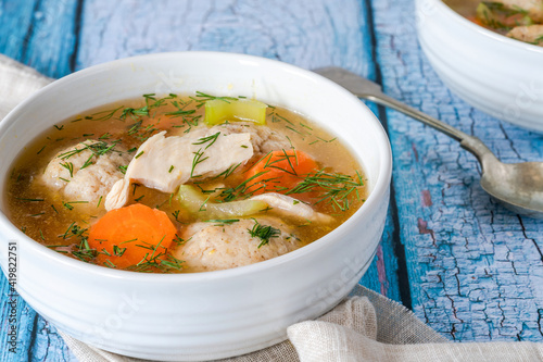 Chicken and matzo ball soup photo