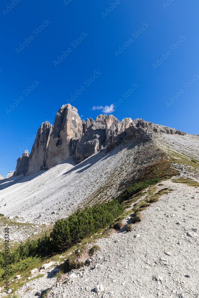 Beautiful view of Tre Cime di Lavaredo. South Tyrol, Italy (Vertical photo) Beautiful view of Tre Cime di Lavaredo. South Tyrol, Italy (Vertical photo)