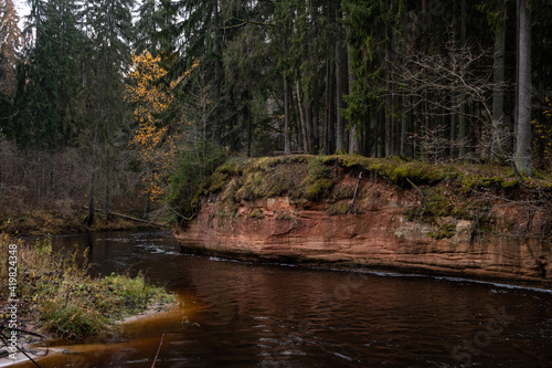 Stuku (Stūķu) Rock by the Amata river during cloudy autumn day in Latvia