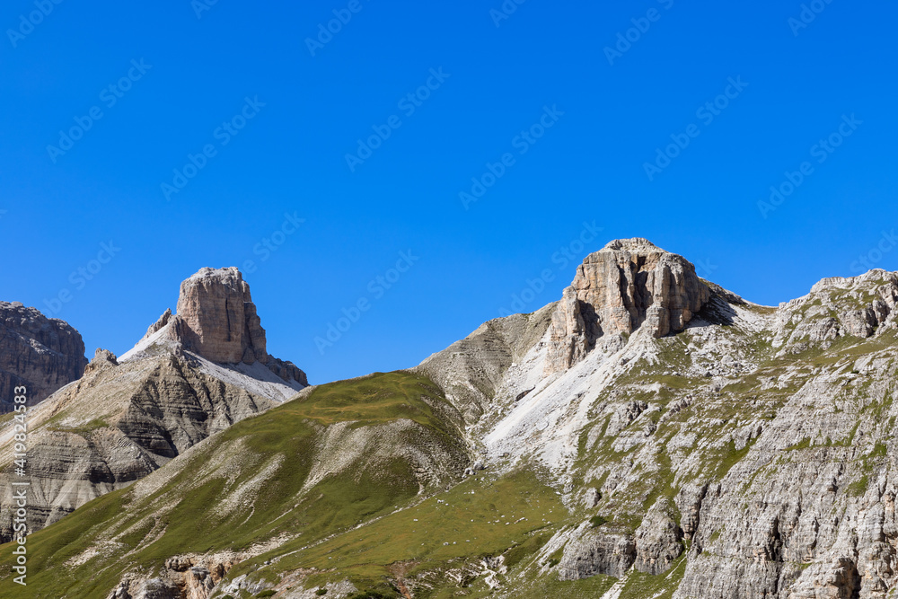 Stunning peaks of Dolomites Alps and alpine meadows. Tre Cime Natural Park. South Tyrol, Italy