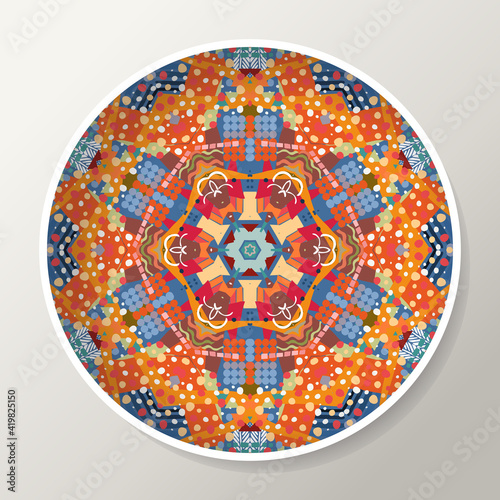 Decorative plate with beautiful ornament with colorful mandala