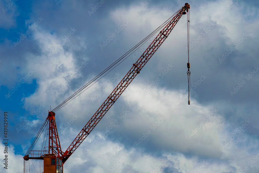 Goat crane against the sky. Sunny summer day. Front view. Goat crane against the sky. Sunny summer day. Front view.