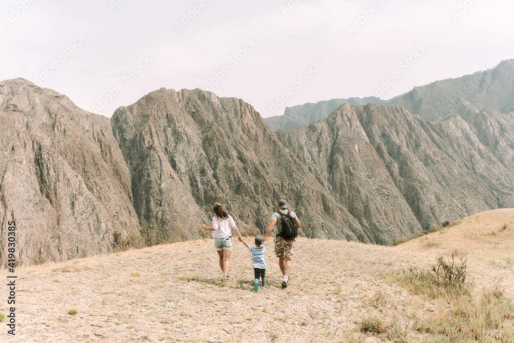 family running in the mountains