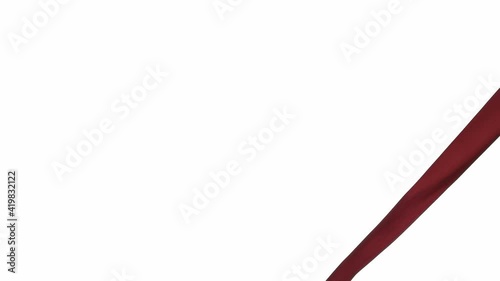 Red fluttering ribbon on white background