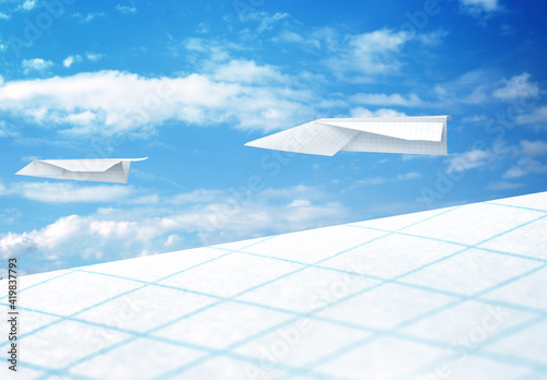 Freedom concept. View from the porthole of a paper plane to the sky with other paper planes. 3d illustration.