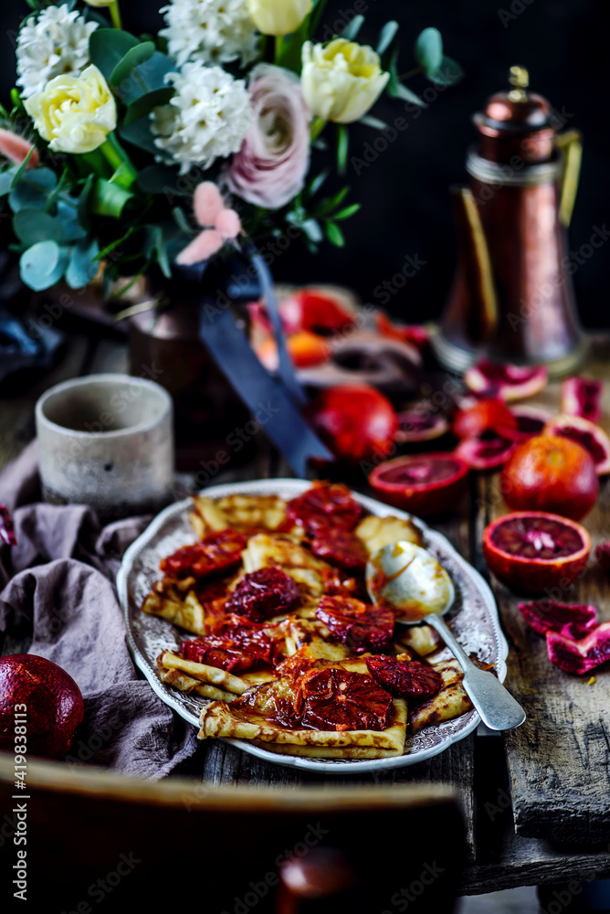 crepe suzette with bloody oranges .selective focus.