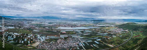 aerial view of agricultural plots of land under cultivation in an agricultural town. Mengzi, Yunnan Province, China
