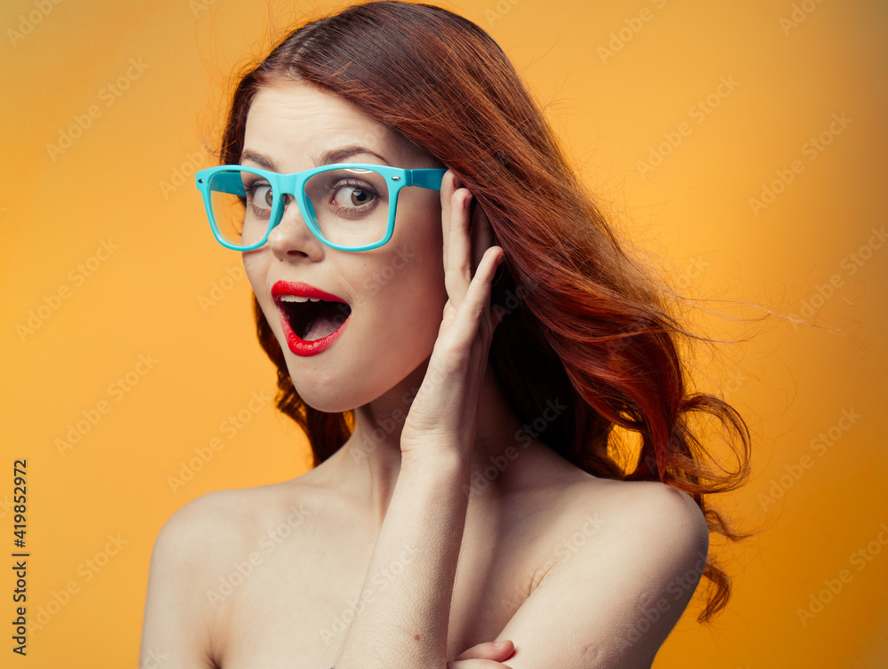 pretty woman naked shoulders red lips glasses luxury yellow background pretty woman naked shoulders red lips glasses luxury yellow background