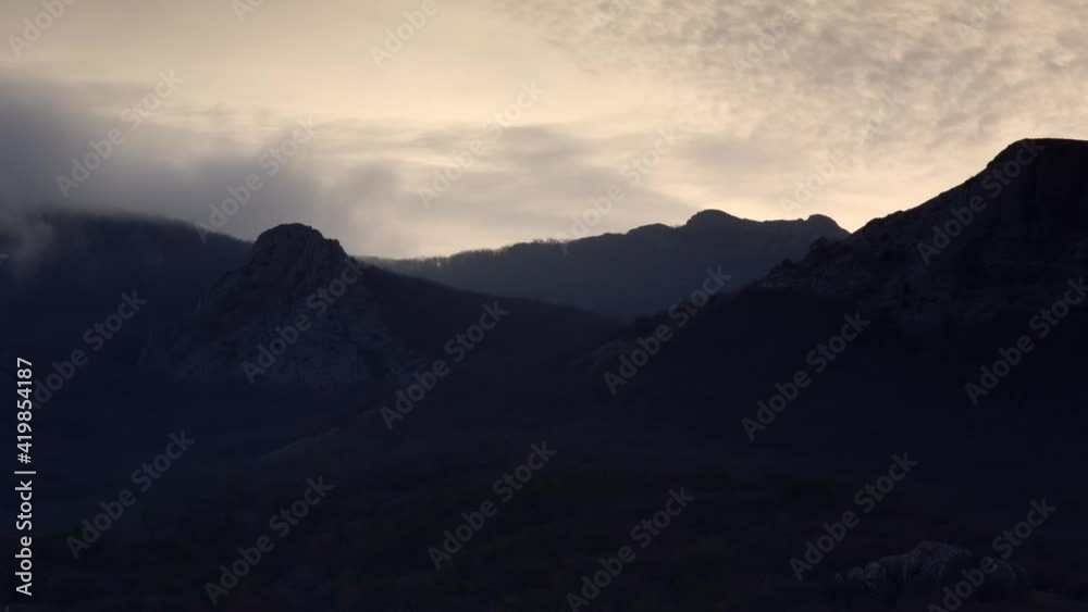 Timelapse. Flight of Clouds and Movement of Fog over the Mountains in Autumn.