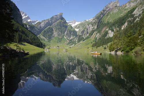 Landscape photo of mountain reflected in lake
