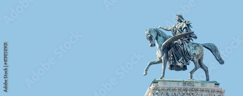 Canvas Print Banner with top roof sculpture of Greek goddess Muse riding Pegasus, a winged horse, at Vienna State Opera House, Vienna, Austria, with copy space