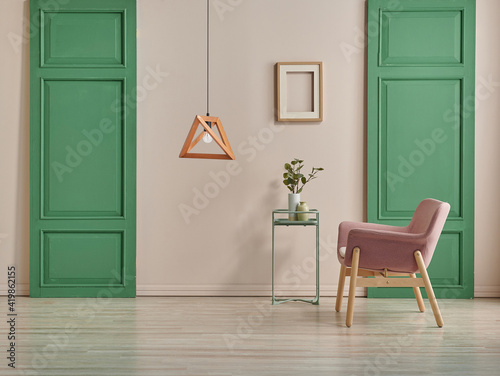 Decorative room and wall concept with green classic door and lamp style.