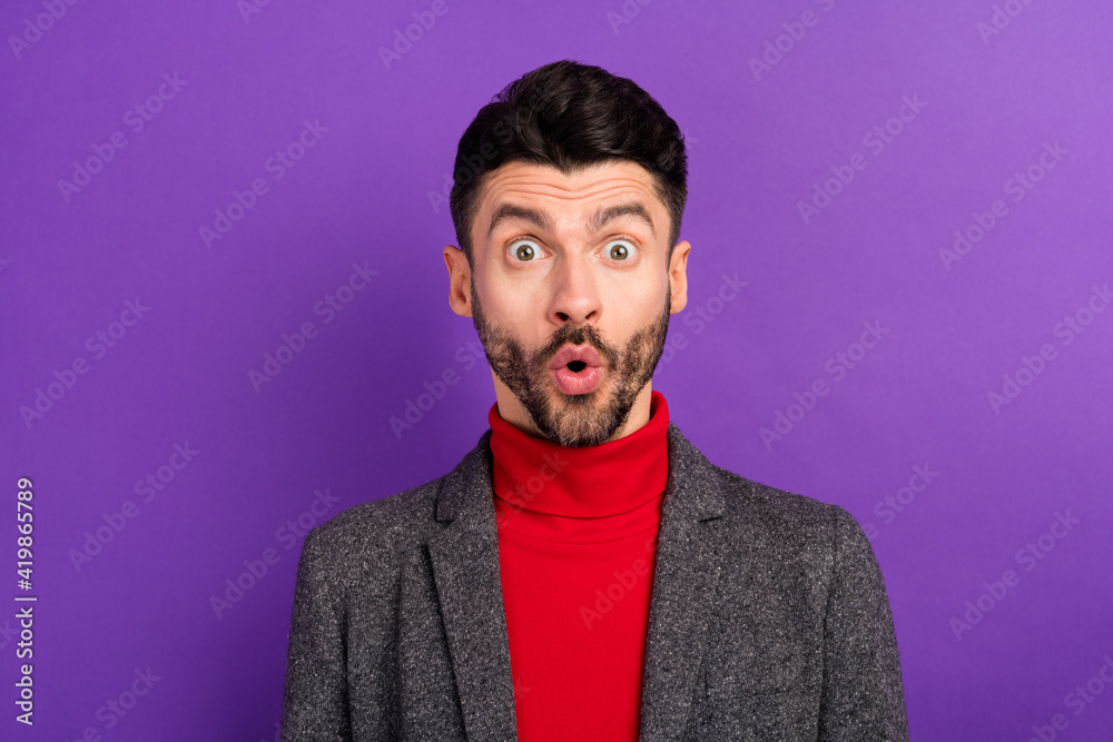 Photo of impressed nice brown hair man wear red sweater jacket isolated on vivid purple color background Photo of impressed nice brown hair man wear red sweater jacket isolated on vivid purple color background