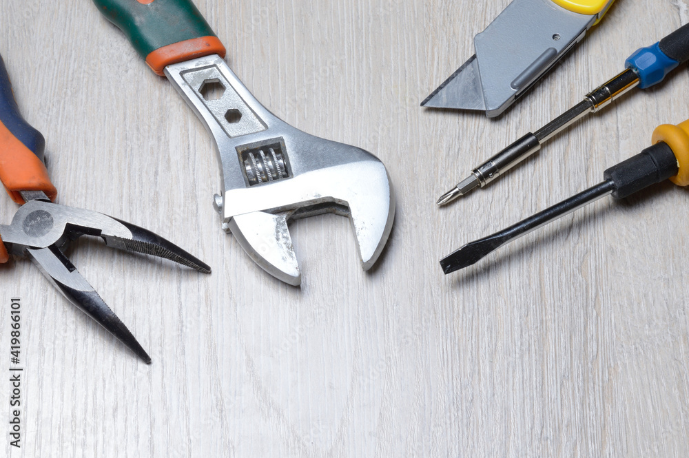tools for minor home repairs are on the countertop. view from above. tools for minor home repairs are on the countertop. view from above.