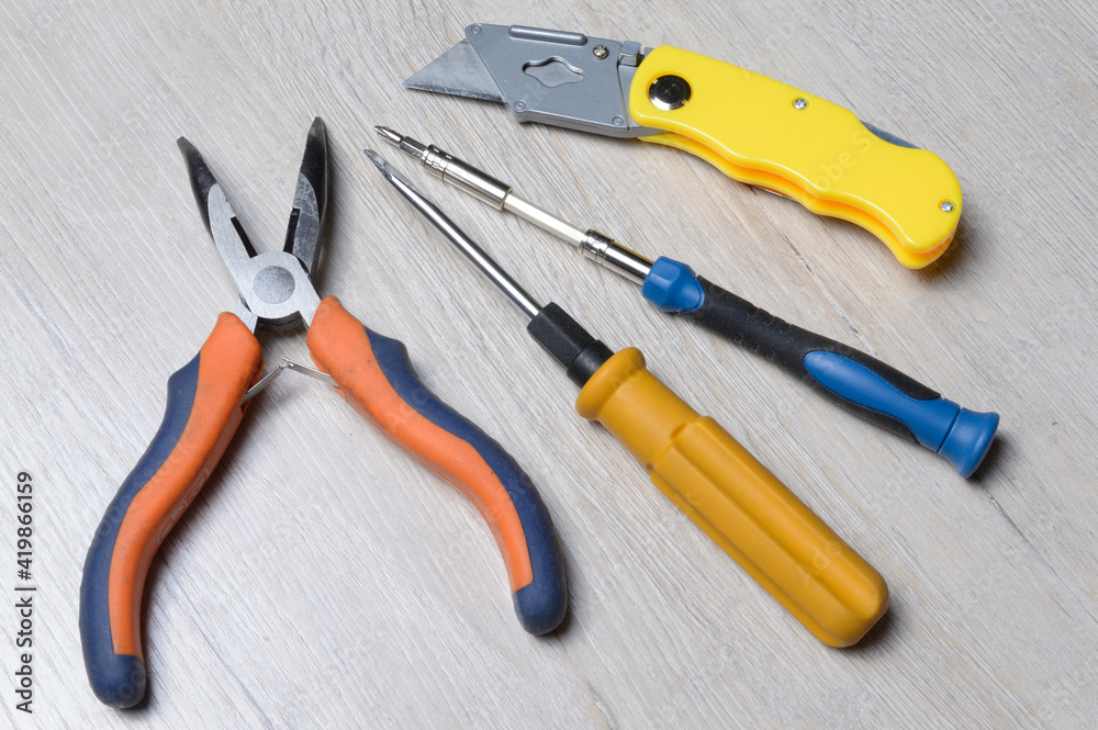 tools for minor home repairs are on the countertop. view from above. tools for minor home repairs are on the countertop. view from above.