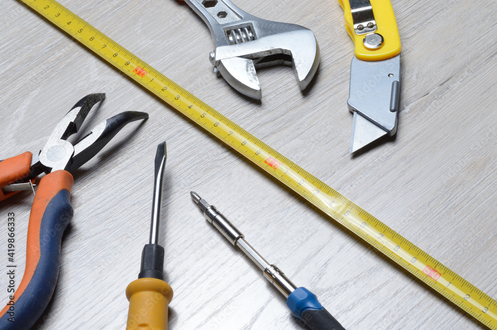 tools for minor home repairs are on the countertop. view from above. tools for minor home repairs are on the countertop. view from above.