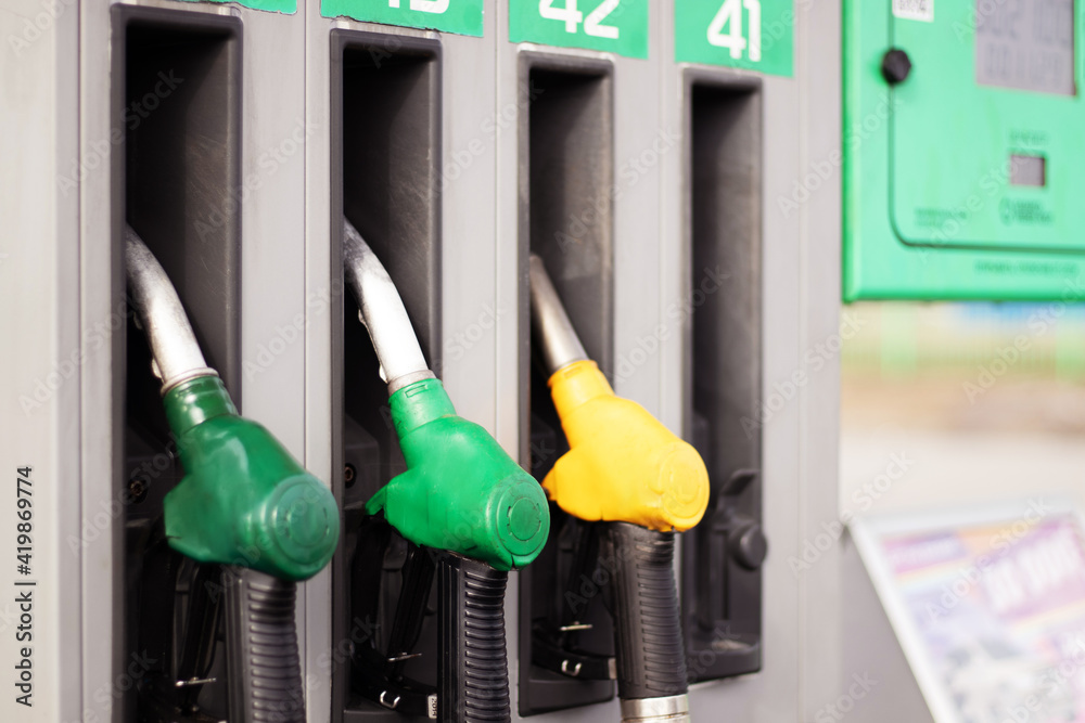 Petrol pump filling nozzles isolated, gas station Petrol pump filling nozzles isolated, gas station
