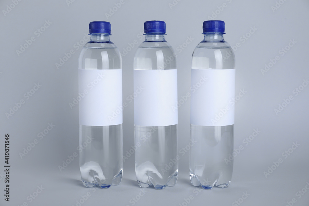 Plastic bottles with soda water on light background Plastic bottles with soda water on light background