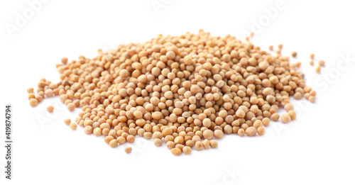 Heap of mustard seeds isolated on white