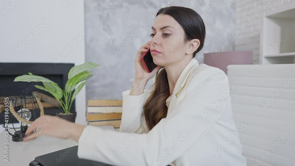 Overworked young woman waking up in office and talking on the phone. Portrait of tired Caucasian slim beautiful employee or CEO sleeping at workplace. Business exhaustion concept. Overworked young woman waking up in office and talking on the phone. Portrait of tired Caucasian slim beautiful employee or CEO sleeping at workplace. Business exhaustion concept.