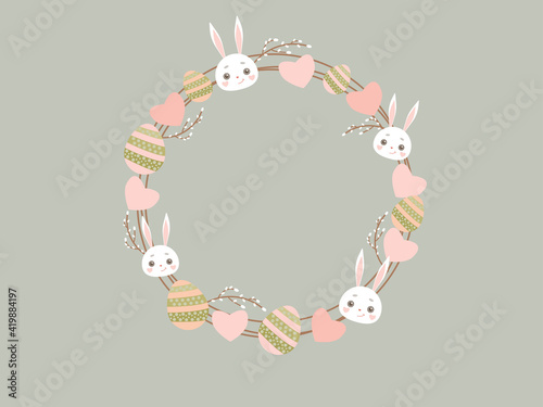 Easter wreath with rabbit, eggs and pussy willow.