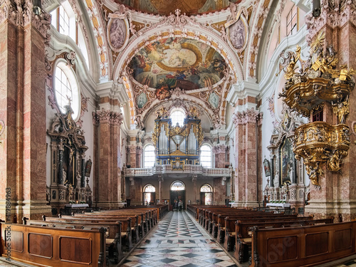 Innsbruck, Austria. Panoramic view of interior of Innsbruck Cathedral (Cathedral of St. James) with main organ. The cathedral was built in 1717-1724. © Mikhail Markovskiy