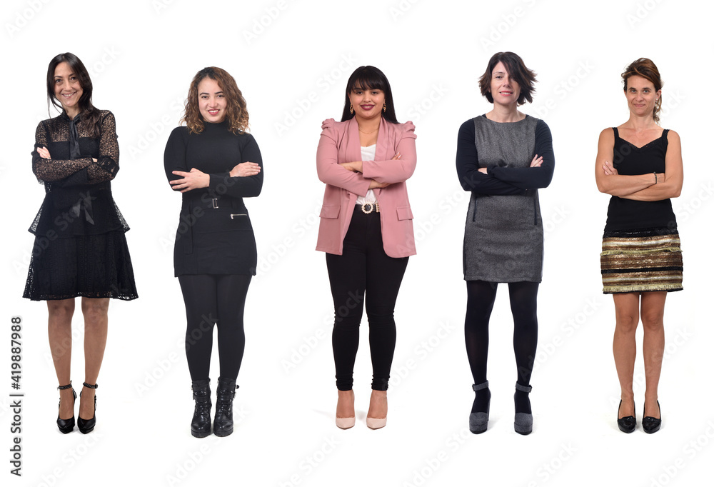 Obraz premium group of elegant women with arms crossed on white background