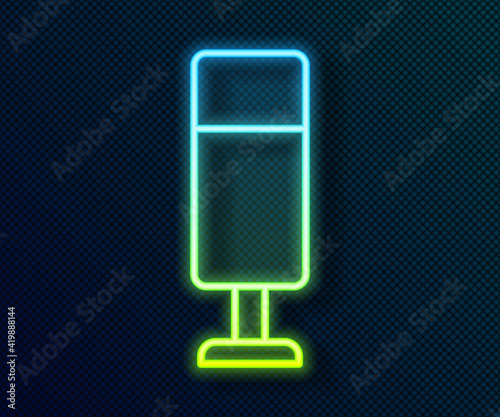 Glowing neon line Punching bag icon isolated on black background. Vector
