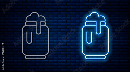 Glowing neon line Beer can with foam icon isolated on brick wall background. Vector
