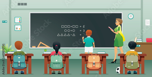 Students are writing answers on the blackboard in front of a class with a teacher.