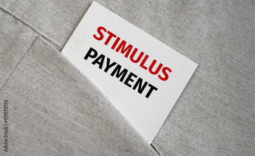 stimulus payment word abstract on cubes against white background.