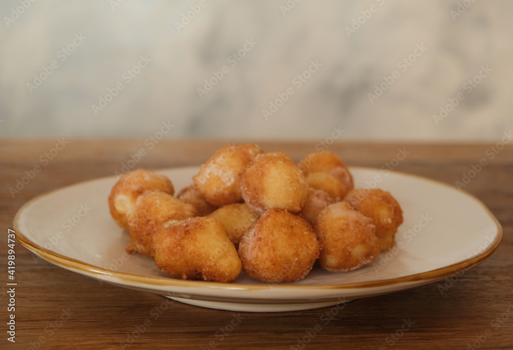 Typical Carnival italian Fritters, Sweet Dough Balls with Icing Sugar, Italy Typical Carnival italian Fritters, Sweet Dough Balls with Icing Sugar, Italy