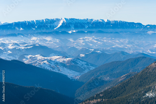 Obraz na płótnie View over Piatra Craiului mountain range in Romania in winter w salonie
